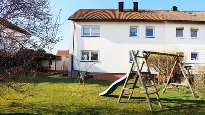 Ein Kinderspielbereich in der Unterkunft Ferienwohnung Am Blauen Hügel in Eckersdorf