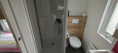 Ein Badezimmer in der Unterkunft Modernes Mobilheim am Murner See