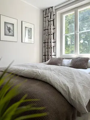 Ein Bett oder Betten in einem Zimmer der Unterkunft Wagner Suite Bayreuth Ideal für Festspielgäste