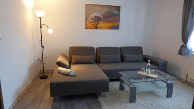 Ein Sitzbereich in der Unterkunft Ferienwohnung Jedermann