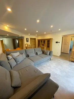 Ein Sitzbereich in der Unterkunft Ferienwohnung Am Sand