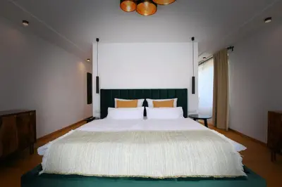Ein Bett oder Betten in einem Zimmer der Unterkunft Landgasthof zur Leonie - Wirtshaus & Boutiquehotel