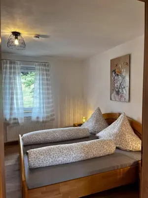 Ein Bett oder Betten in einem Zimmer der Unterkunft Ferienwohnung Naturtraum