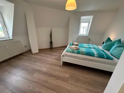 Ein Bett oder Betten in einem Zimmer der Unterkunft Appartment mit Aussicht 