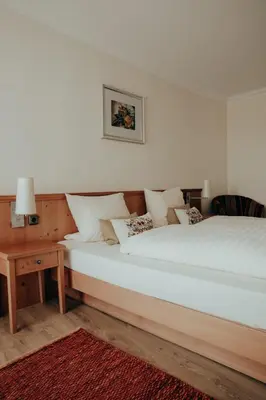 Ein Bett oder Betten in einem Zimmer der Unterkunft Hotel Weyh