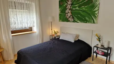 Ein Bett oder Betten in einem Zimmer der Unterkunft Das kleine Anders