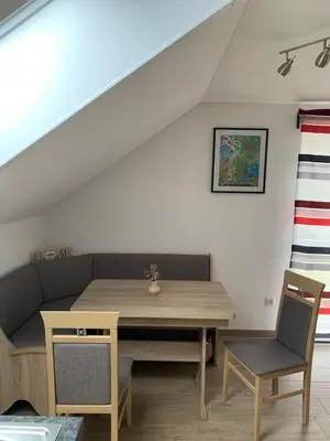 Ein Sitzbereich in der Unterkunft Husky-Hof