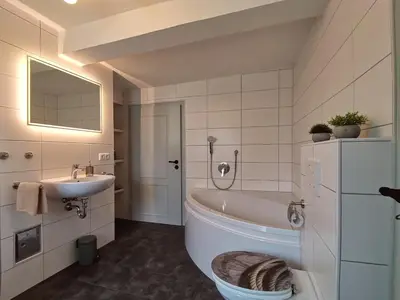 Ein Badezimmer in der Unterkunft Ferienwohnung beim Gangolfsturm