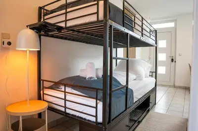 Ein Bett oder Betten in einem Zimmer der Unterkunft JH Apartments Nittenau - Design Studio Modern