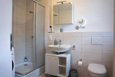 Ein Badezimmer in der Unterkunft JH Apartments Nittenau - Design Studio Modern