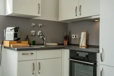 Küche/Küchenzeile in der Unterkunft JH Apartments Nittenau - Design Studio Modern