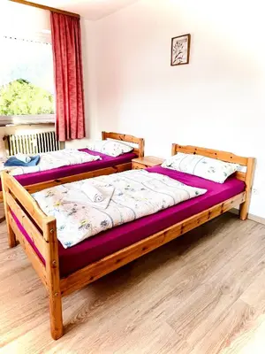 Ein Bett oder Betten in einem Zimmer der Unterkunft Gasthof-Pension Silberhaus