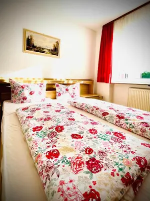 Ein Bett oder Betten in einem Zimmer der Unterkunft Gasthof-Pension Silberhaus