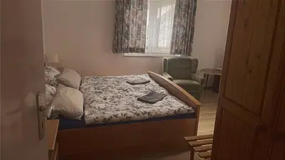 Ein Bett oder Betten in einem Zimmer der Unterkunft Gasthof-Pension Silberhaus