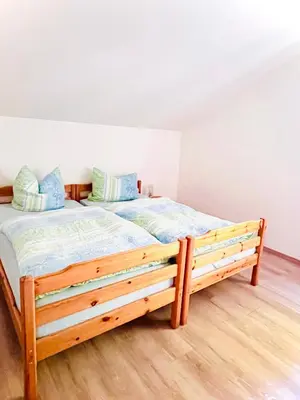 Ein Bett oder Betten in einem Zimmer der Unterkunft Gasthof-Pension Silberhaus