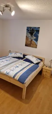 Ein Bett oder Betten in einem Zimmer der Unterkunft Burgblick