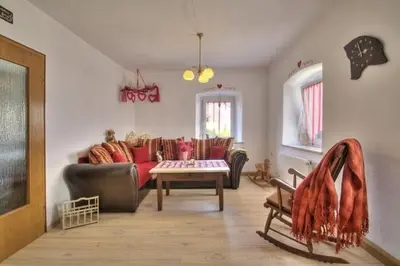 Ein Sitzbereich in der Unterkunft Haus Ella