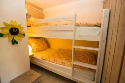 Ein Bett oder Betten in einem Zimmer der Unterkunft Haus Ella