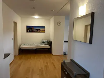Ein Bett oder Betten in einem Zimmer der Unterkunft Charmante, offene Wohnung in zentraler Lage