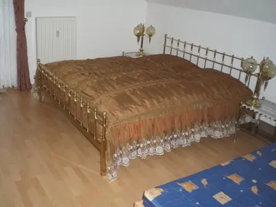 Ein Bett oder Betten in einem Zimmer der Unterkunft Ferienwohnung Fichtelwald