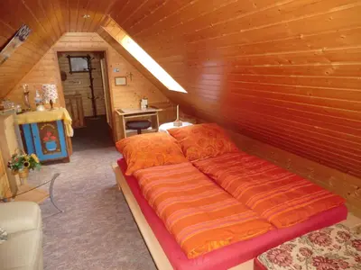Ein Bett oder Betten in einem Zimmer der Unterkunft Ferienwohnung Unger