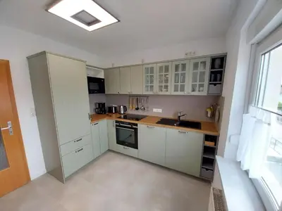 Küche/Küchenzeile in der Unterkunft Gemütliche Apartments in Steinberg am See für Arbeit & Urlaub
