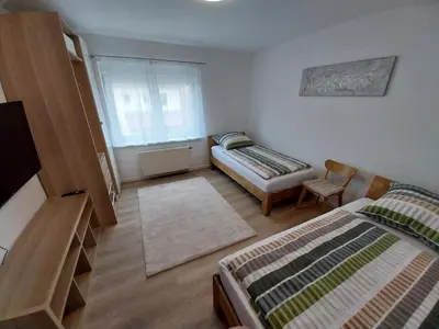 Ein Bett oder Betten in einem Zimmer der Unterkunft Gemütliche Apartments in Steinberg am See für Arbeit & Urlaub