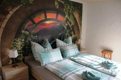 Ein Bett oder Betten in einem Zimmer der Unterkunft FeWo Schätzler