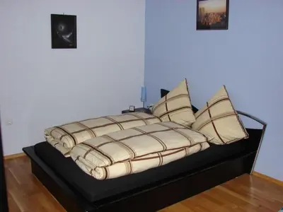 Ein Bett oder Betten in einem Zimmer der Unterkunft NEU Ferienwohnung Gudrun