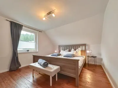 Ein Bett oder Betten in einem Zimmer der Unterkunft Hochfels