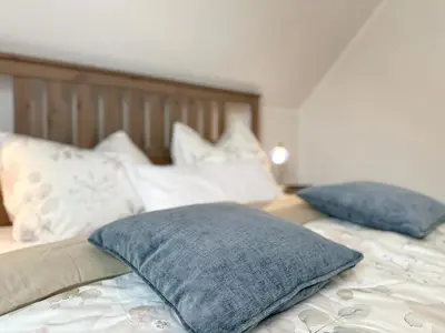 Ein Bett oder Betten in einem Zimmer der Unterkunft Hochfels