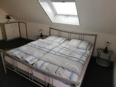 Ein Bett oder Betten in einem Zimmer der Unterkunft Ferienwohnung Linden