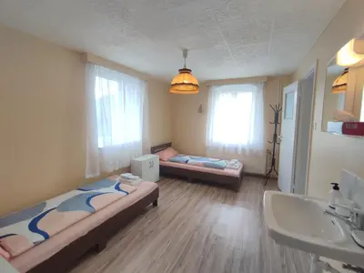 Ein Bett oder Betten in einem Zimmer der Unterkunft FerienHaus 