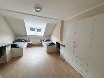 Ein Bett oder Betten in einem Zimmer der Unterkunft FeWo, Unterkunft für Dienstreisen Unterkunft in Rehau, DE
