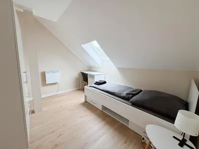 Ein Bett oder Betten in einem Zimmer der Unterkunft FeWo, Unterkunft für Dienstreisen Unterkunft in Rehau, DE