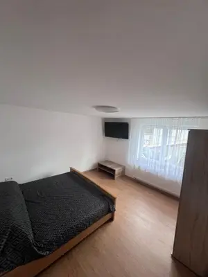 Ein Bett oder Betten in einem Zimmer der Unterkunft Busu