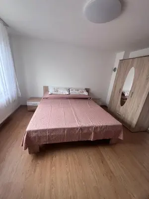 Ein Bett oder Betten in einem Zimmer der Unterkunft Busu