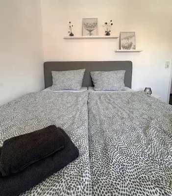 Ein Bett oder Betten in einem Zimmer der Unterkunft Wohnen im Herzen von Kulmbach