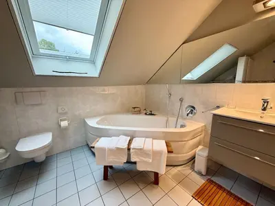 Ein Badezimmer in der Unterkunft Domizil am Festspielhaus
