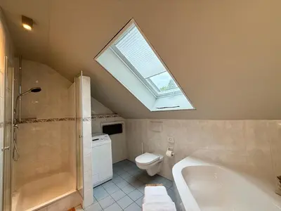 Ein Badezimmer in der Unterkunft Domizil am Festspielhaus