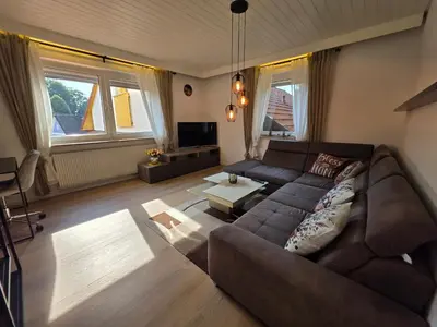 Ein Sitzbereich in der Unterkunft Ferienwohnung Am Bärenstein, Fränkische Schweiz