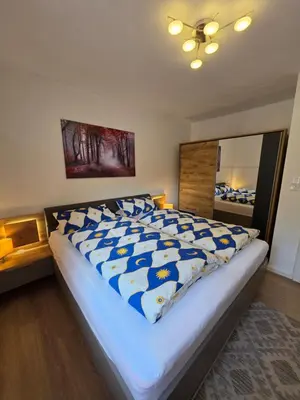 Ein Bett oder Betten in einem Zimmer der Unterkunft Ferienwohnung Am Bärenstein, Fränkische Schweiz