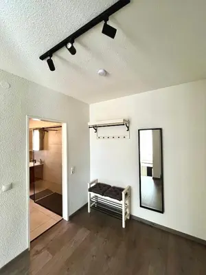 Ein Bett oder Betten in einem Zimmer der Unterkunft Ferienwohnung mit Dachterrasse