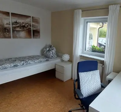 Ein Bett oder Betten in einem Zimmer der Unterkunft Wohnung in Selbitz