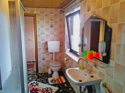 Ein Badezimmer in der Unterkunft Ferienwohnung Baumann Alois
