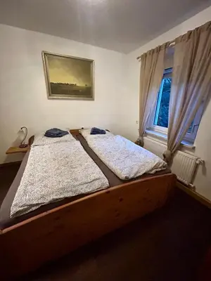 Ein Bett oder Betten in einem Zimmer der Unterkunft Gemütlich wohnen in Blankenstein am Rennsteig