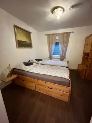 Ein Bett oder Betten in einem Zimmer der Unterkunft Gemütlich wohnen in Blankenstein am Rennsteig