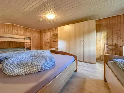 Ein Bett oder Betten in einem Zimmer der Unterkunft Rehberg Hütte