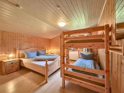 Ein Bett oder Betten in einem Zimmer der Unterkunft Rehberg Hütte