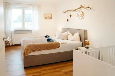 Ein Bett oder Betten in einem Zimmer der Unterkunft Ferienwohnung Ohne Gleichen